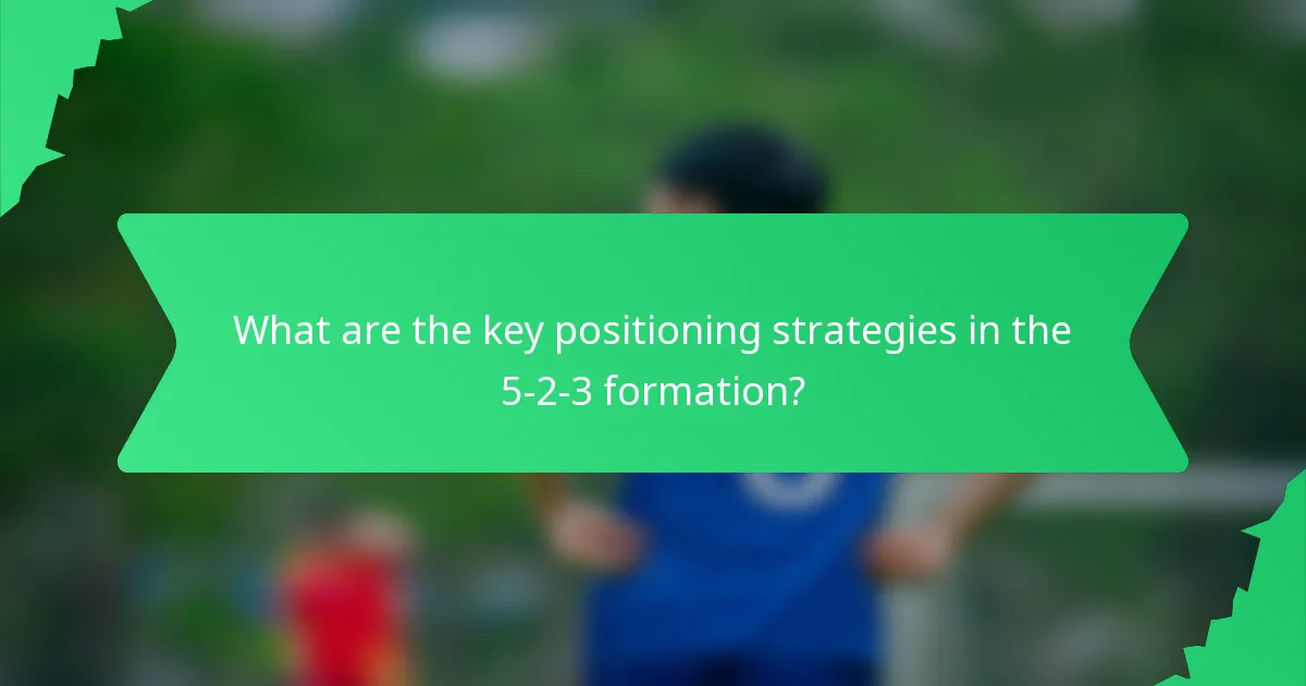 What are the key positioning strategies in the 5-2-3 formation?